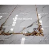 Elegant French-style marble inlay floor with white base and decorative corner tile medallions in gold and floral colors.