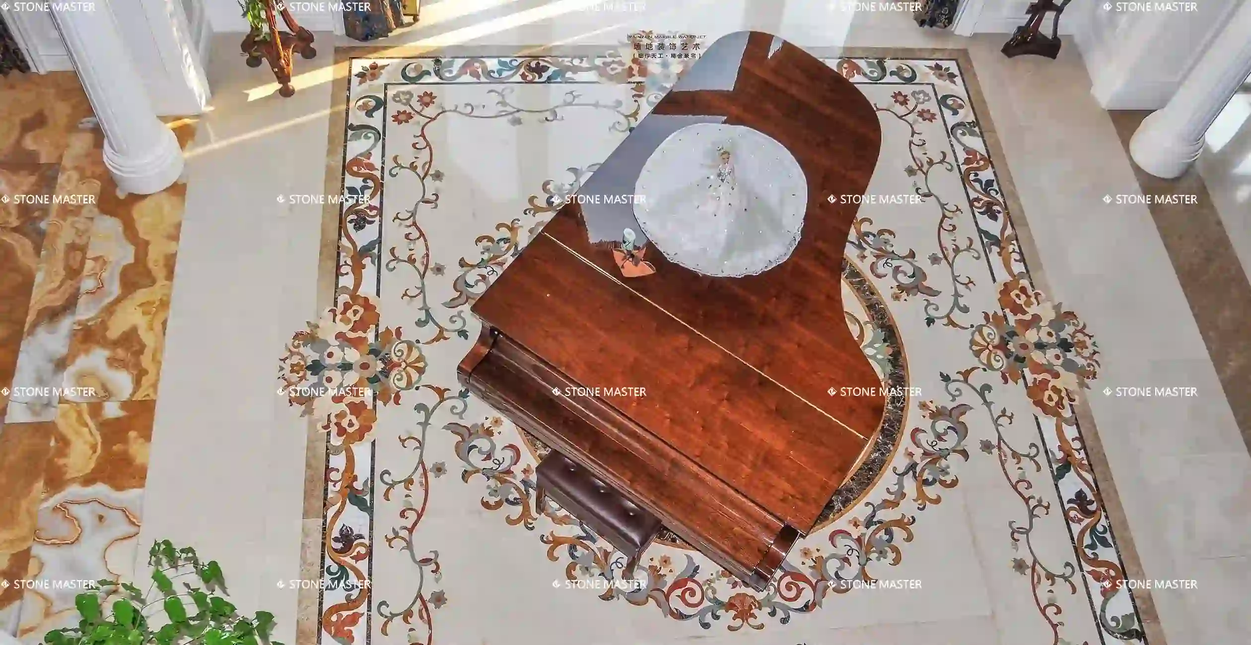 Marble inlay flooring installation with floral medallion centerpiece in a luxury villa lobby