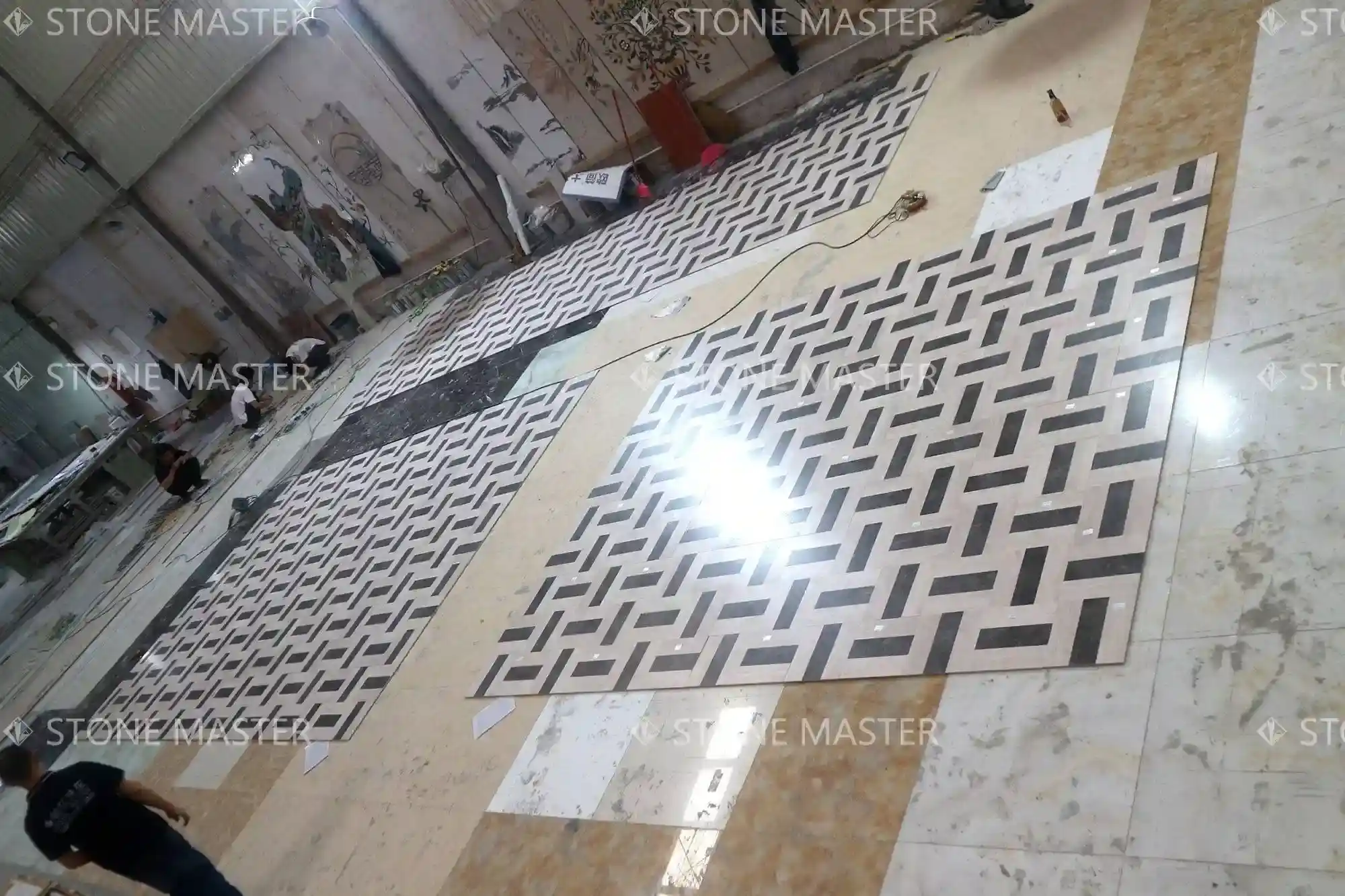 Handcrafted marble medallion with high-gloss finish integrated into luxury custom marble floors.