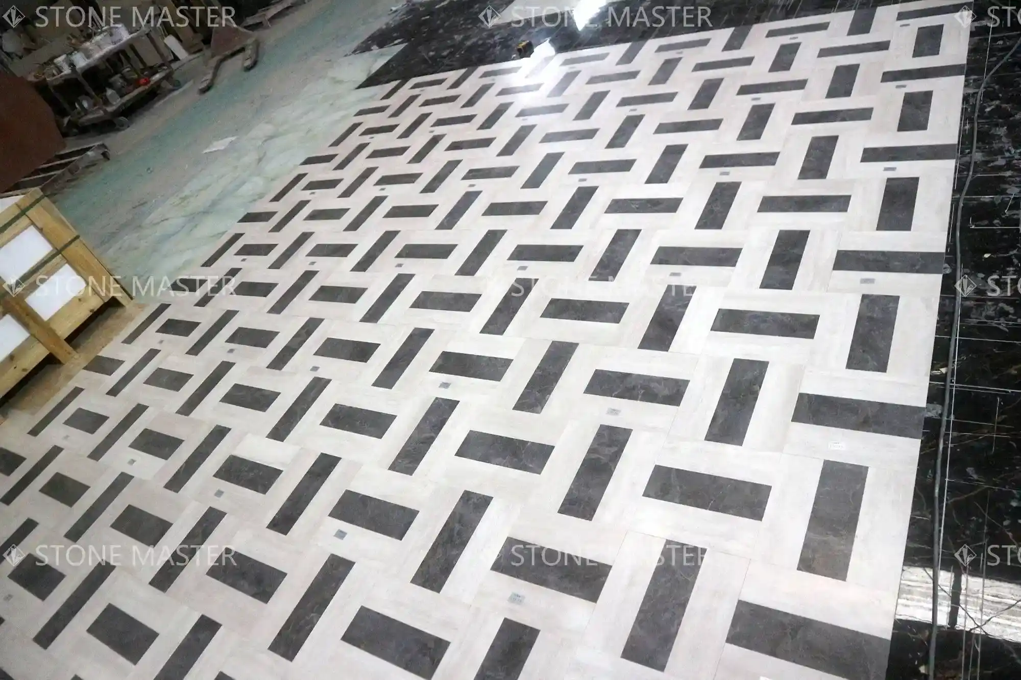 Handcrafted marble medallion with high-gloss finish integrated into luxury custom marble floors.