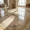Marble floor medallion crafted with Italian marble inlay and luxury natural stone. Custom designs for marble and tile flooring in residential and commercial spaces.
