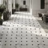 Modern floor design with black and white geometric marble medallions for luxury marble inlay flooring interiors Modern floor design with black and white geometric marble medallions for luxury marble inlay flooring interiors