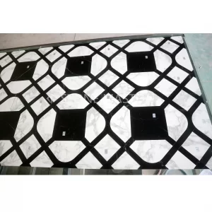 Marble inlay floor with black and white high-contrast custom marble inlay design for modern luxury interior floor applications.