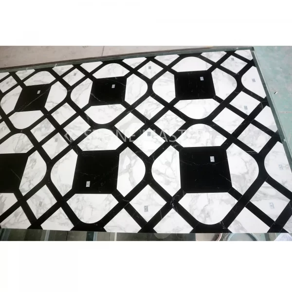 Marble inlay floor with black and white high-contrast custom marble inlay design for modern luxury interior floor applications.