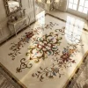 Tile medallions featuring Italian marble inlay floor design for luxury villa interiors with custom patterns and natural stone details
