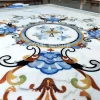 Tile Floor Medallions in premium marble flooring tiles showcasing modern luxury design for grand foyers with intricate custom marble inlay pattern
